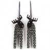 Moose, long, straight antlers, black w white dots, black head