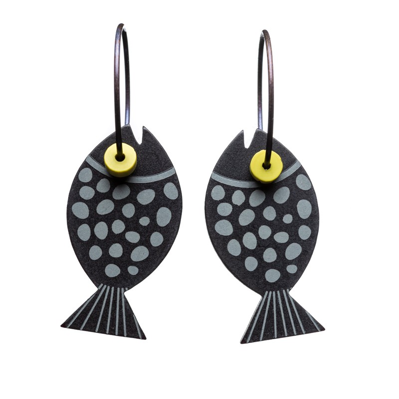 Fish, black with grey dots, yellow eye