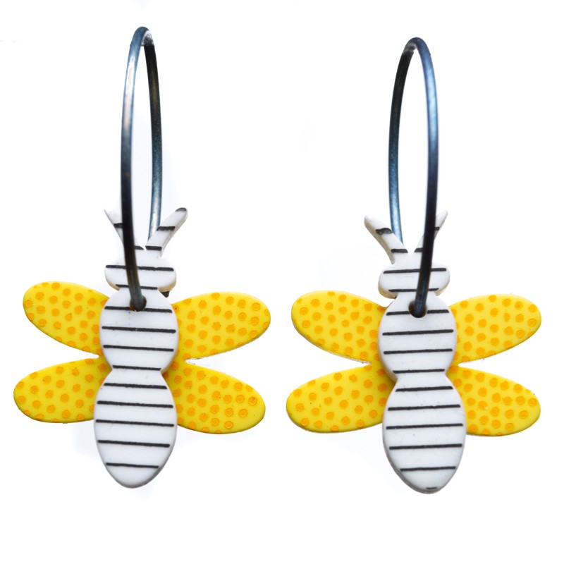 Bumblebee, white with black stripes, yellow wings with dots