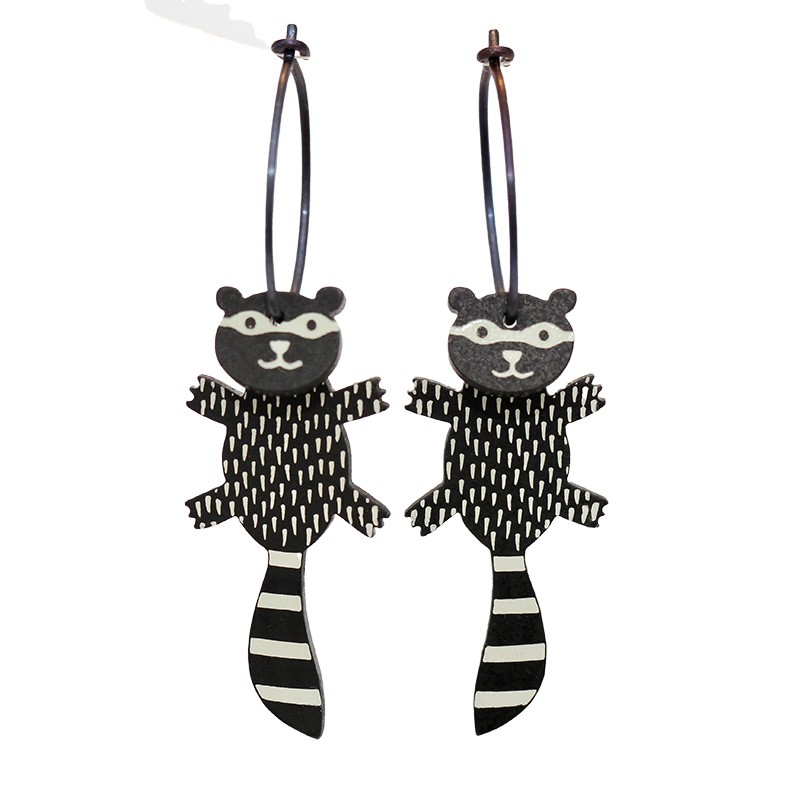 Raccoon, black with white dots, black head