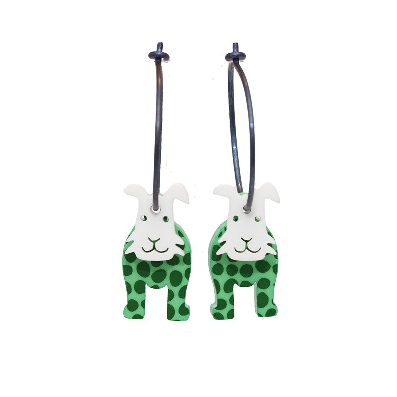 Dog, short ears, green w green dots, white head