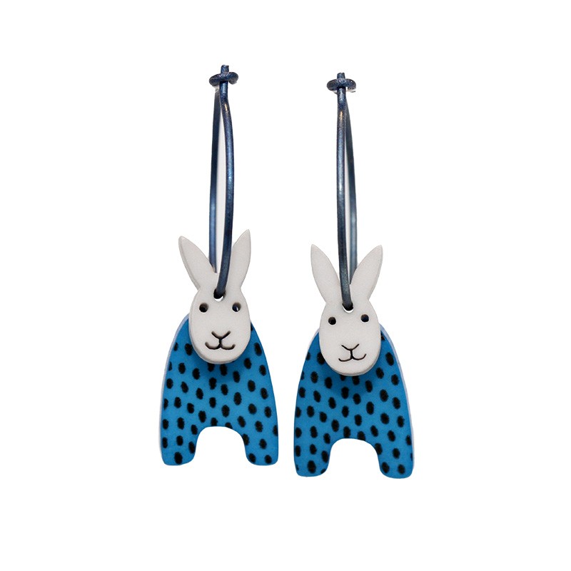 Rabbit, upright ears, blue w black dots, grey head