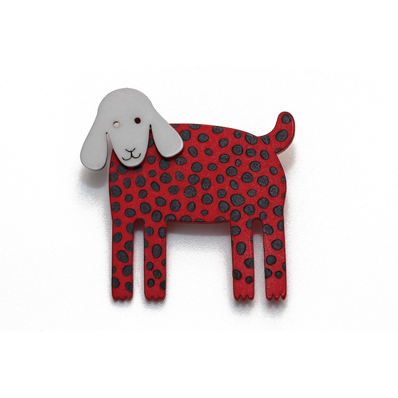 Dog, hanging ears, red w black dots, grey head