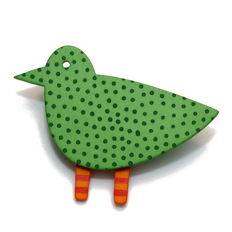 Fugl, grøn m mørkegrønne små prikker, orange ben m røde striber