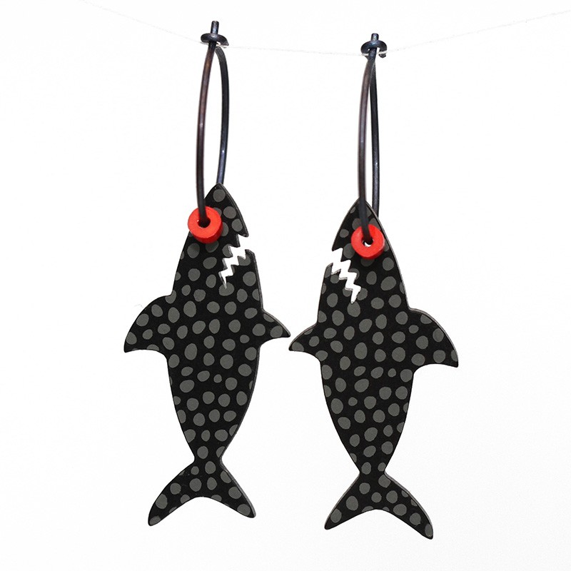 Shark, black w grey dots, orange eyes