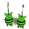 Pig, green with black stripes, green head