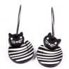 Cat, round, black w white stripes, black head