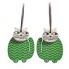 Cat, sitting, green w black zigzag stripes, grey head