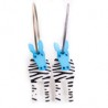 Zebra, white with black stripes, light blue head
