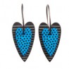 Heart, blue with dots, black background with stripes