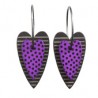 Heart, purple with dots, black background with stripes